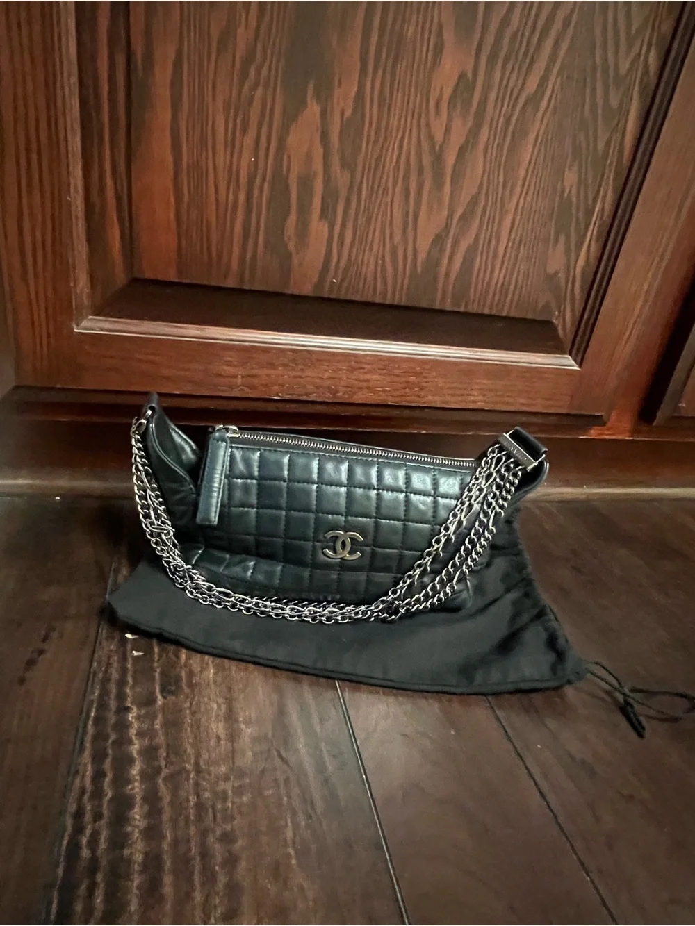 CHANEL Black Quilted Leather Shoulder Bag with Chain Strap and CC Logo